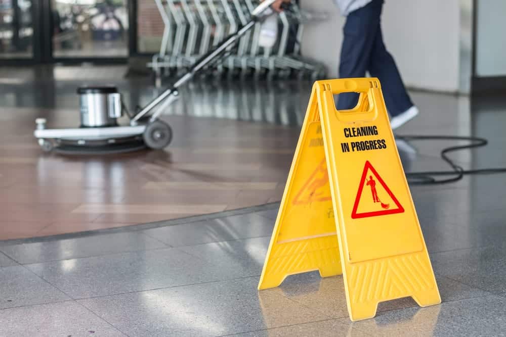 Whitehall carpet cleaning technician cleaning white carpet in Columbia SC area home